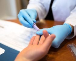 Doctor tests a patient for HIV AIDS.